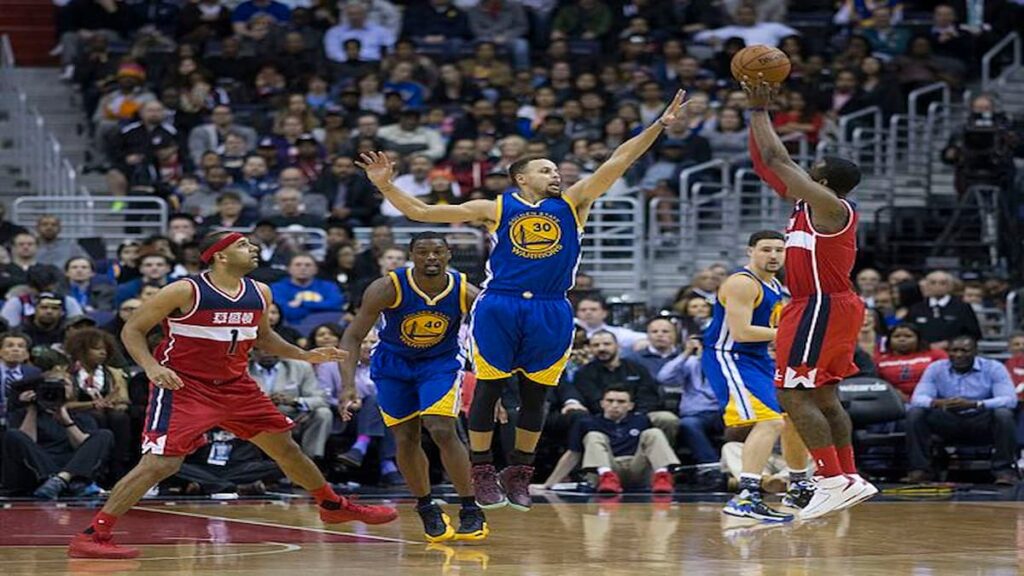 Stephen Curry three point shooting form during NBA game
