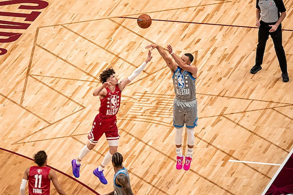 Stephen Curry shooting over defender during NBA game